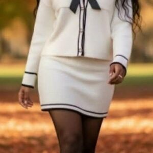Elegant Cream Skirt with Black Trim